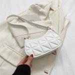 "Fashionable Leather Tote: Retro, casual, solid color shoulder bag for women."