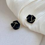 LATS Black Flower Stud Earrings feature a folded, multi-layer enamel design for a chic, floral look.