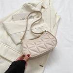 "Fashionable Leather Tote: Retro, casual, solid color shoulder bag for women."